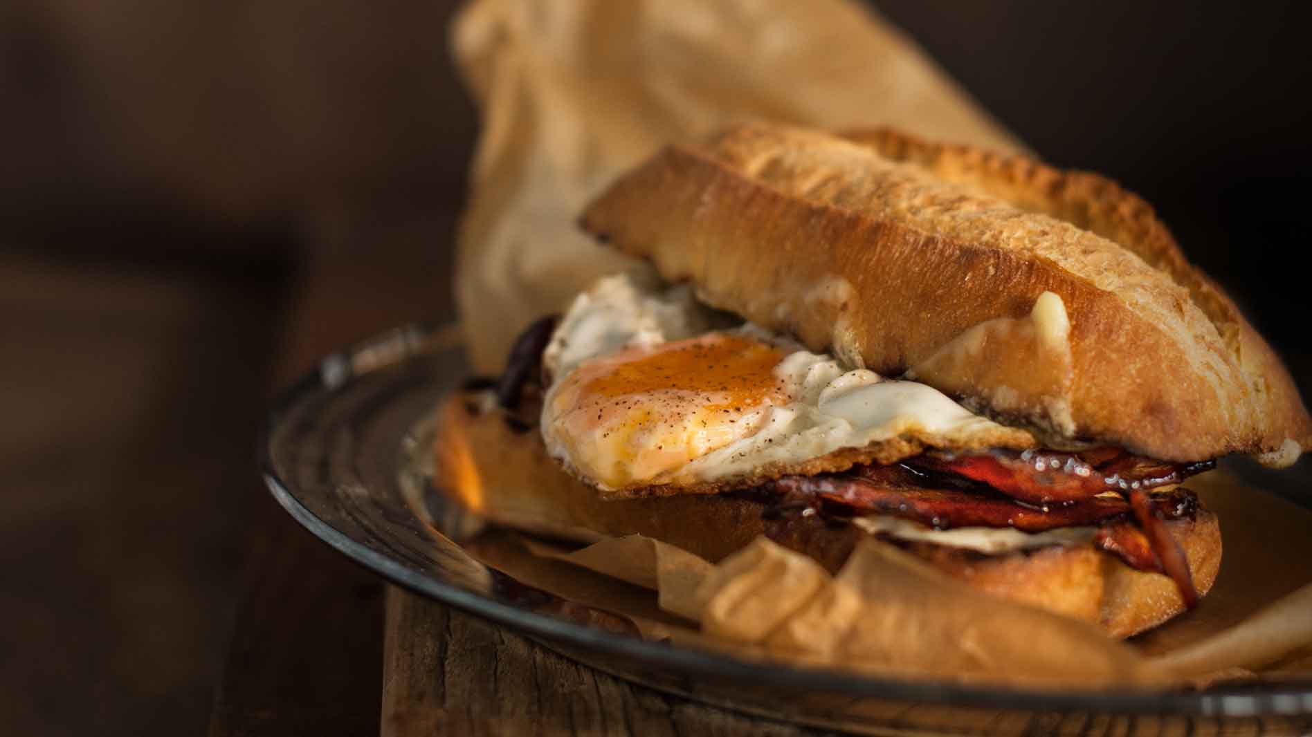 Egg & honey bacon artisan ciabatta roll With jarlsburg & green tabasco mayonnaise
